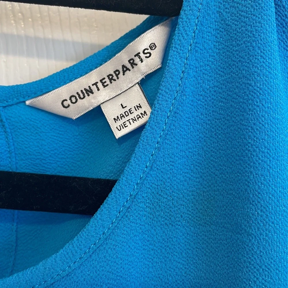Turquoise ruffle sleeveless top - Picture 2 of 6